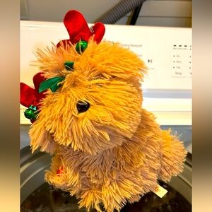 Collectible Dan Dee spinning, musical dog. “Jingle Bells Tune”
